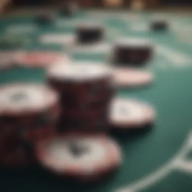 Close-up of poker chips stacked on a table with cards laid out